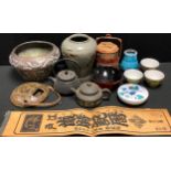 A Chinese Yixing teapot; a Japanese stoneware vase; a bronze jardiniere; tea bowls; etc