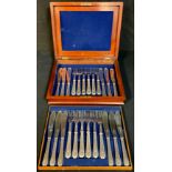 A Victorian canteen of silver and silver plated fish knives and forks, the knives hallmarked