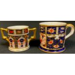 A Royal Crown Derby Imari palette 1128 pattern miniature two-handled loving cup, 3.5cm, printed