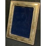 An Elizabeth II silver rectangular easel photograph frame, Sheffield 2010, 16cm x 12.5cm