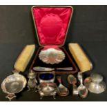 A silver capstan inkwell, Birmingham 1910; a silver caddy spoon, the haft with disc for King