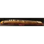 A Chinese guzheng, of typical form, 183cm long, carrying case en suite