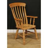 A Victorian style beech lath back kitchen chair, 113cm high, 66cm wide, the seat 43cm wide and