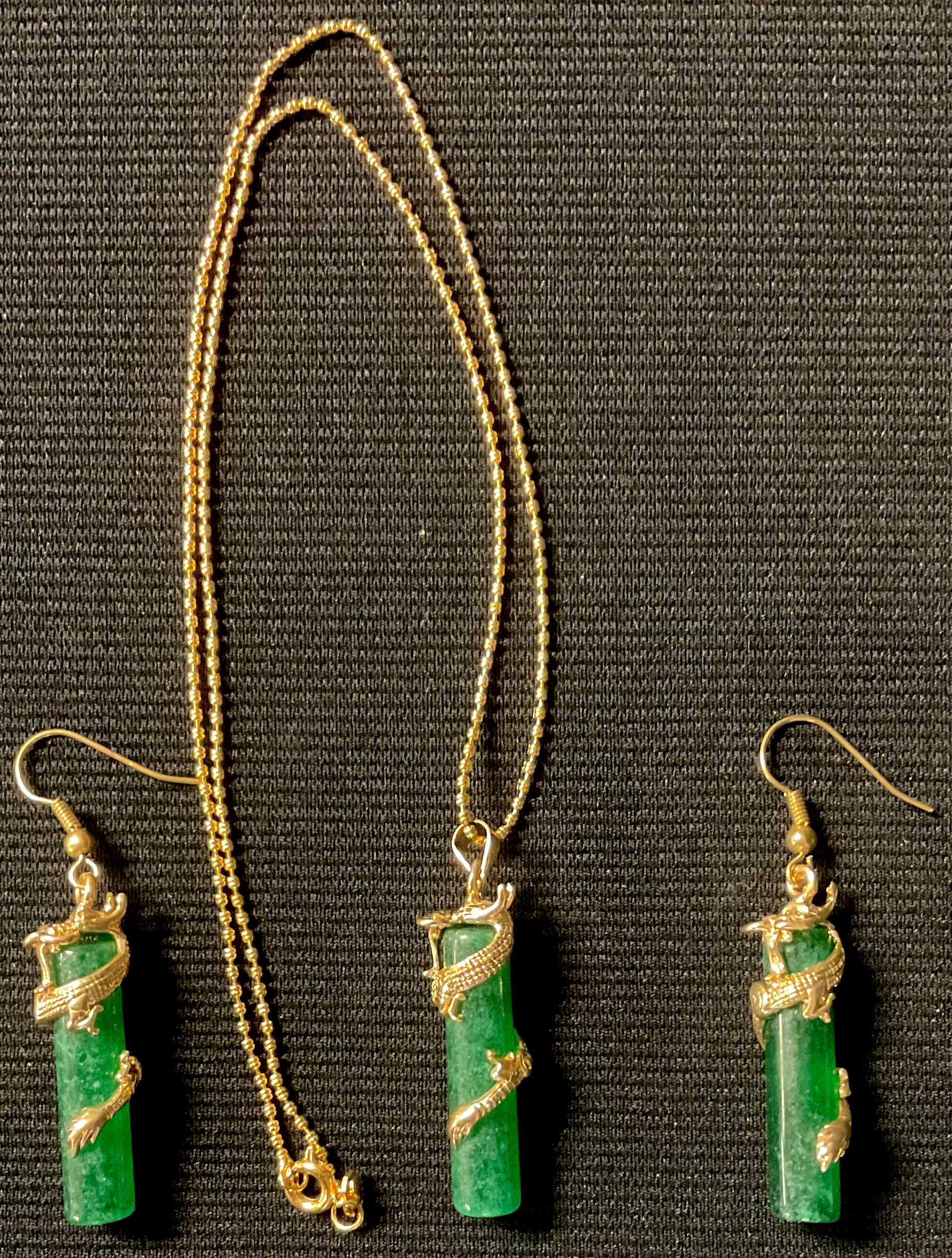 A pair of Chinese Jade dragon earrings and necklace set