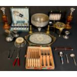 A brass trivet; assorted EPNS flatware; a cut throat razor; dressing table tray and powder bowl; a