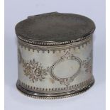 A Victorian E.P.N.S oval tobacco box, bright-cut engraved, the hinged cover enclosing a lead