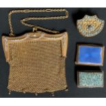 A lady's evening purse, set with paste stones; an enamel match case; a snuff box inlaid with