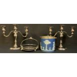 A pair of WMF silver plated two-branch candlesticks; a Wedgwood Jasperware biscuit barrel with