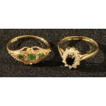 A 9ct gold sapphire and diamond cluster ring, 1.8g; a 9ct gold emerald and diamond ring, 2g (2)