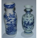 A Japanese porcelain inverted baluster vase, well-painted with a profusions of chrysanthemums and