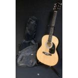 Musical Instruments - a Martin Smith acoustic guitar, in fitted case, with stand (2)
