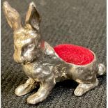 A silver novelty pin cushion, as a hare