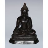 A Burmese bronze Buddha, seated in meditation, 20.5cm high