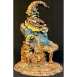 A late 19th century Mr Punch cast iron door stop, 32cm