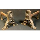 A pair of 19th century cast iron and iron hearth irons