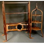 An Edwardian mahogany inlaid three tier tripod cake stand, spire finial, 95cm; an oak hall mirror
