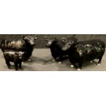 A Beswick model of an Aberdeen Angus Bull, Aberdeen Angus Cow and Aberdeen Angus Calf, printed marks