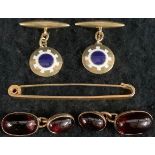 A pair of 18ct gold enamelled cufflinks, 6.1g gross; another pair, 9ct, set with garnets, 8.19g