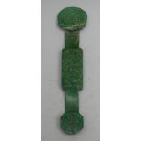 A Chinese green hardstone ruyi sceptre, carved in the Archaic manner with scrolling foliage and