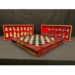 A novelty Chinese chess set and board/case, moulded resin pieces, 46cm open