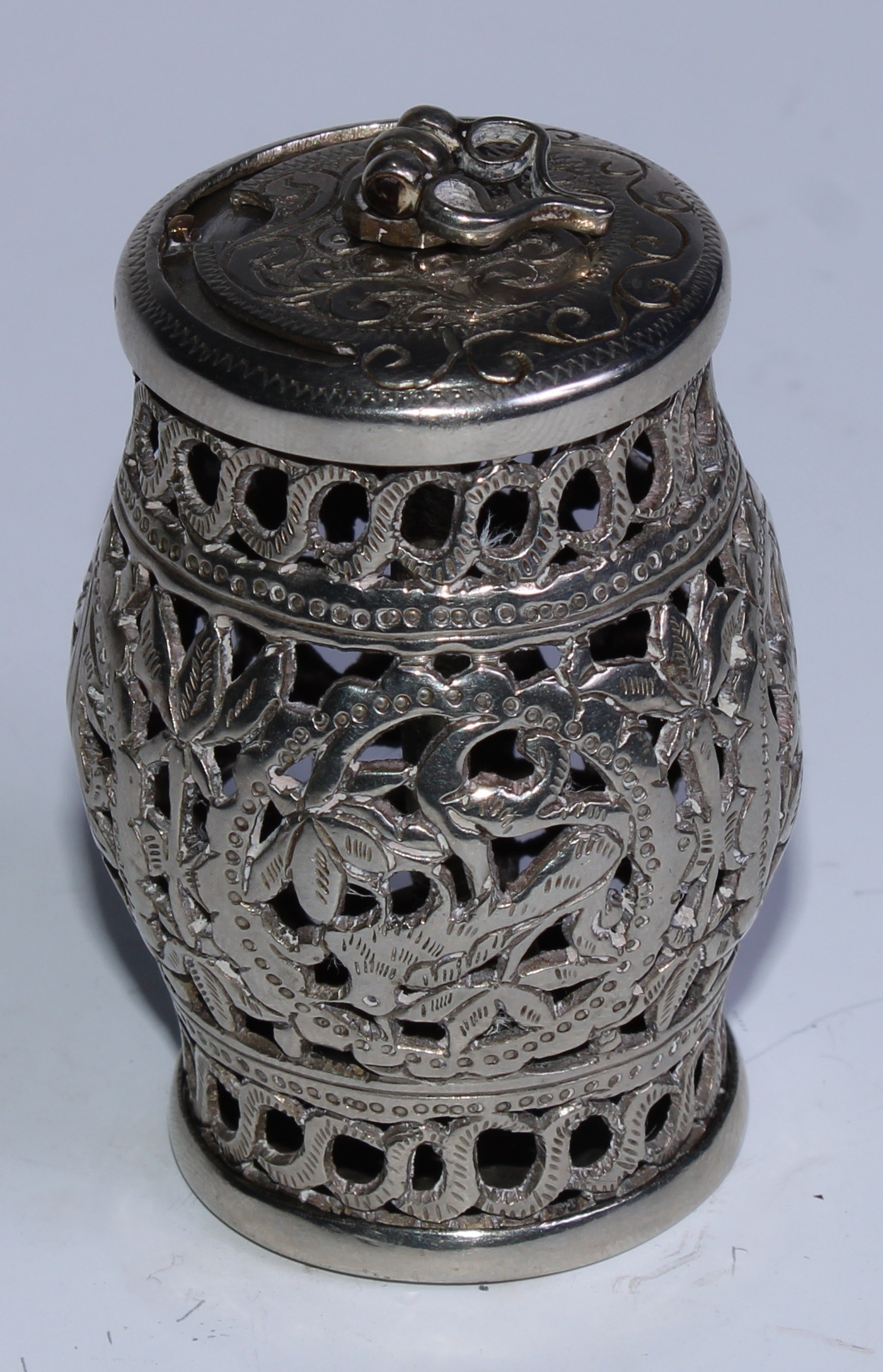 A Chinese silver coloured metal cricket box, sliding aperture cover, 7cm high