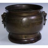 A large Chinese bronze censer, everted rim above a band of trellis centred by script character