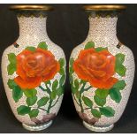 A pair of Chinese cloisonné vases, decorated with roses and butterfly, 20cm high