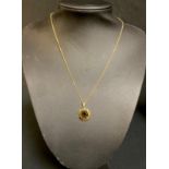 A 9ct gold smokey quartz pendant and chain, 4.6g