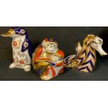 A Royal Crown Derby paperweight, Monkey with baby, silver stopper; two others, Seahorse, no stopper;