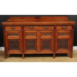 A late Victorian Aesthetic Movement low dresser or sideboard, rectangular top above three drawers