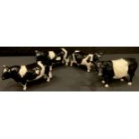 A Beswick model of a Belted Galloway Cow; a Beswick model of Champion Claybury Leegwater; two models
