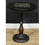 A gilt and abalone decorated papier-mâché and ebonised occasional games table, circular tilting
