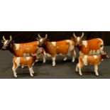 A Beswick model of a Ayrshire Cow Ch. Ickham Bessie; two others; two Ayrshire Calves (5)