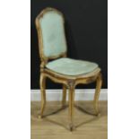A French Louis XV Revival painted softwood boudoir side chair, cartouche shaped back, carved with