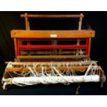 A mid 20th century Weavemaster tabletop loom