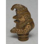 A late 19th century novelty brass vesta case, as Mr Punch, the hinged cover with an inset strike,
