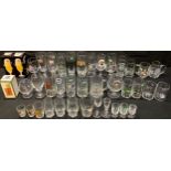 A collection of German advertising drinking glasses