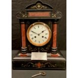 A late 19th century French black slate and rouge marble architectural mantel clock, white enamel