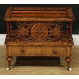A Victorian walnut three-section Canterbury, drawer to frieze, turned legs, ceramic casters, 50.