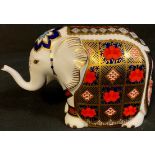 A Royal Crown Derby paperweight, Imari Elephant, trunk raised, silver stopper