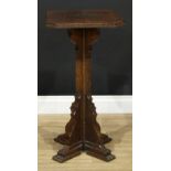 An ecclesiastical design oak statuary pedestal or jardiniere stand, adzed throughout, 76cm high, the