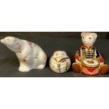 A Royal Crown Derby paperweight, Posie Polar Bear, silver stopper; two others, Harvest Mouse,