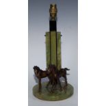 An Art Deco brown-patinated and green onyx equestrian table-lamp, the circular plateau with a pair