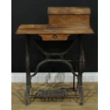 A late 19th century Jones Family sewing machine, serial number 44782, treadle base, 95cm high,