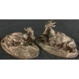English School, a pair of brown patinated bronzes, Goats, reclining to the left and right, 14cm wide