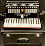 A Parrot piano accordion, hard carry case