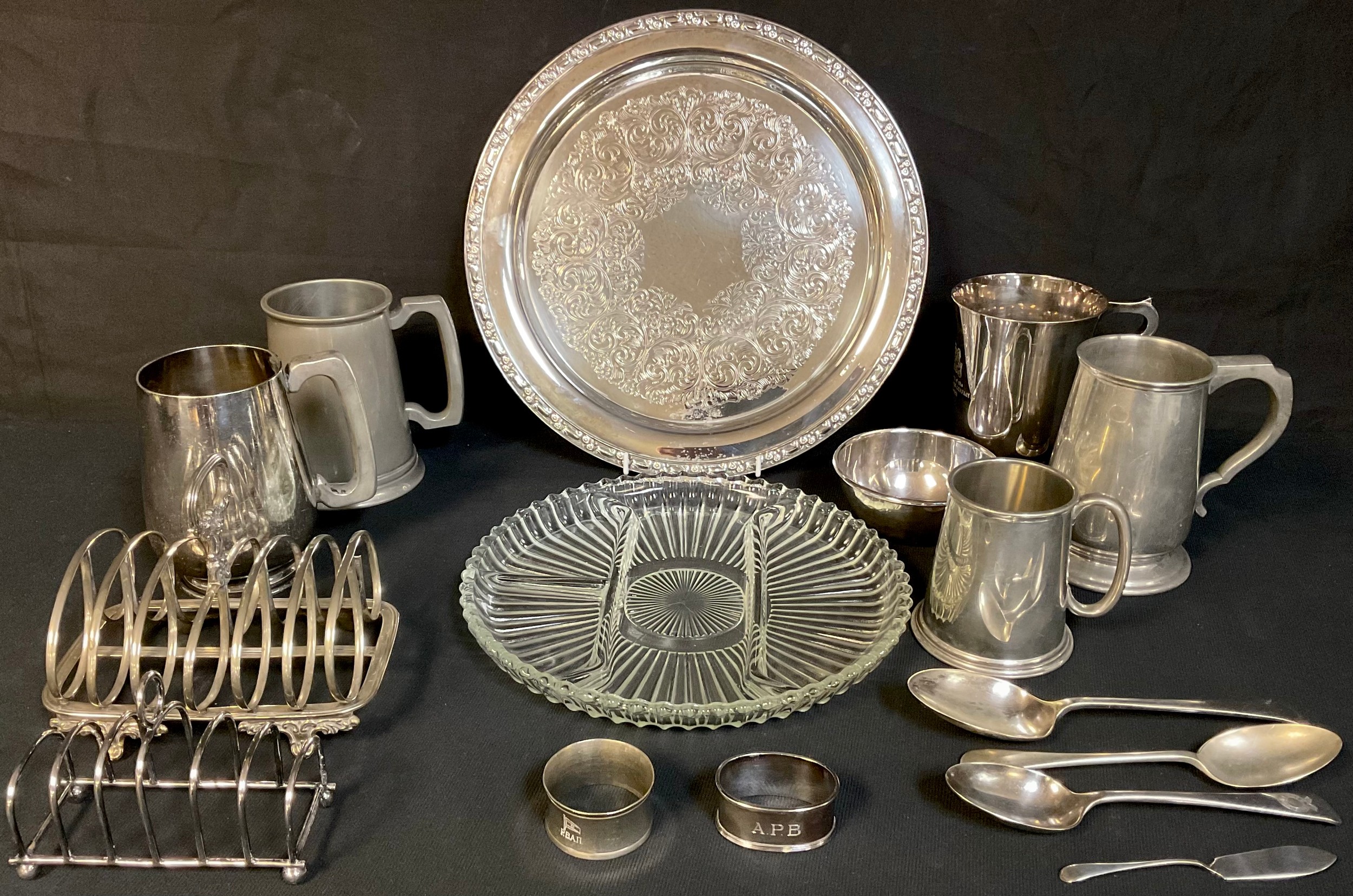 A silver napkin ring, Birmingham 1920; silver plated and pewter mugs, toast racks, spoons; qty