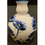 A William Moorcroft Macintyre Florian Ware Poppy pattern gourd shaped bottle vase, 10cm, signed in