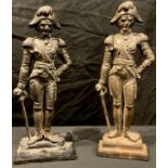 Military Interest - two 19th century cast iron doorstops or door porters, cast as military