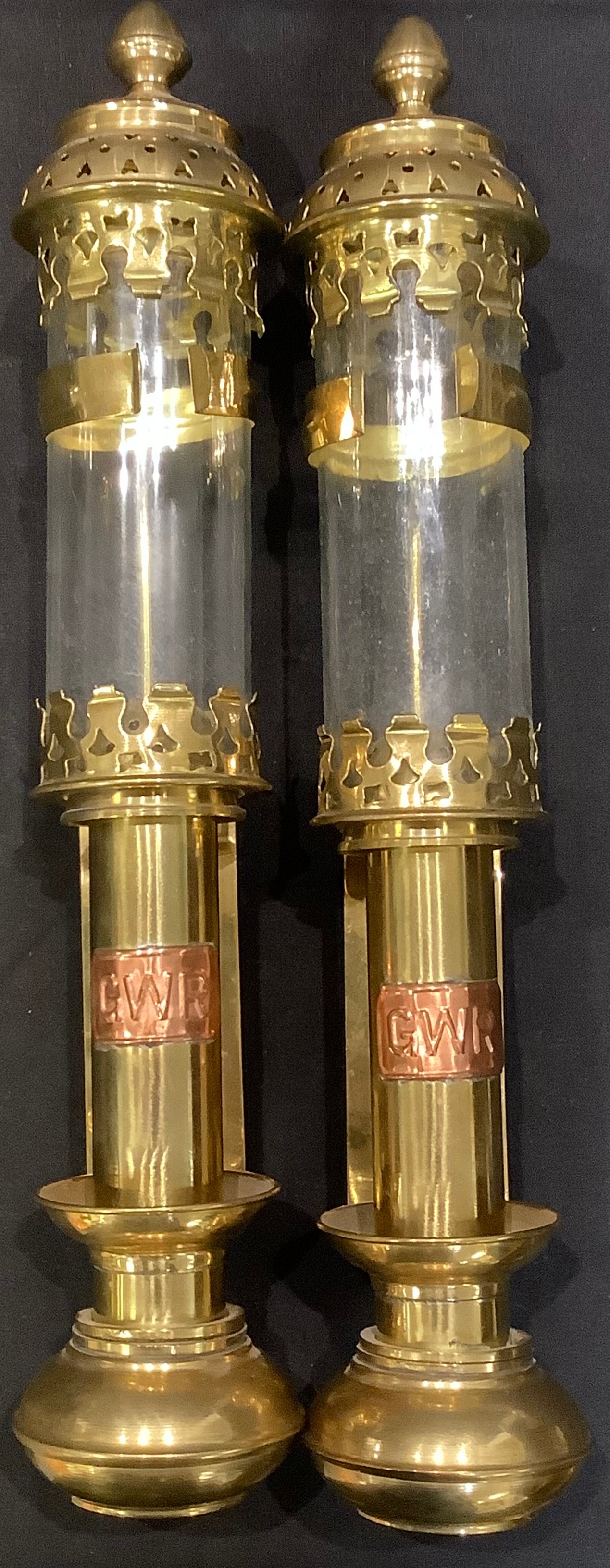 A pair of brass railway carriage lamps, copper GWR plaques, 36cm long